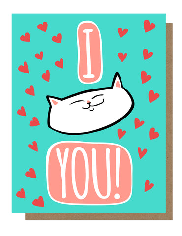 Greeting card with a cartoon image of a white cat surrounded by pink and blue hearts, with the text 'I [image of cat] You!'