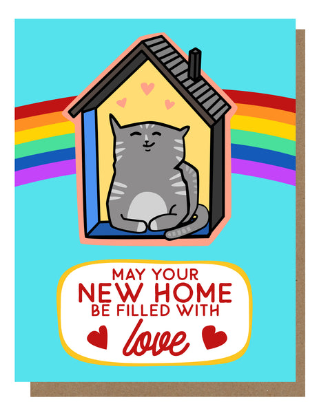 Image of cat sitting in a house with a blue background and a rainbow behind the house. Text reads “May your new home be filled with love.”